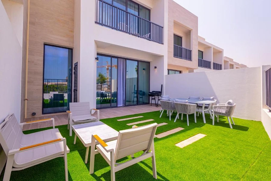 Luxury outdoor living area with artificial turf